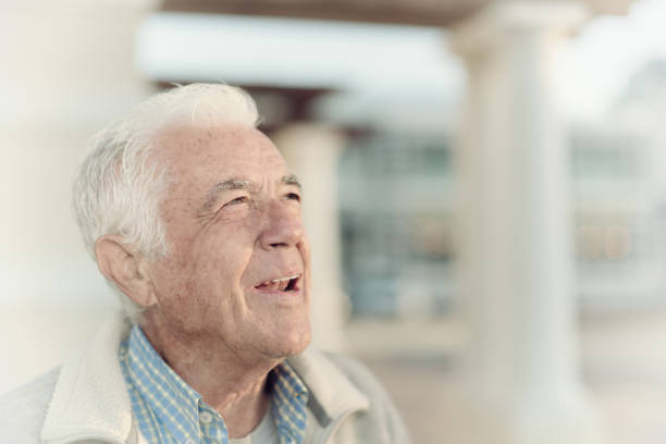 istock Handsome senior man looks up apprehensively 1158206038
