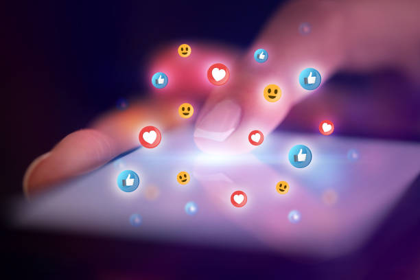 istock Finger touching phone with social media concept 1158207420