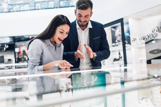 istock Middle age couple in jewelry store 1158207502