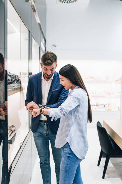istock Middle age couple in jewelry store 1158207552