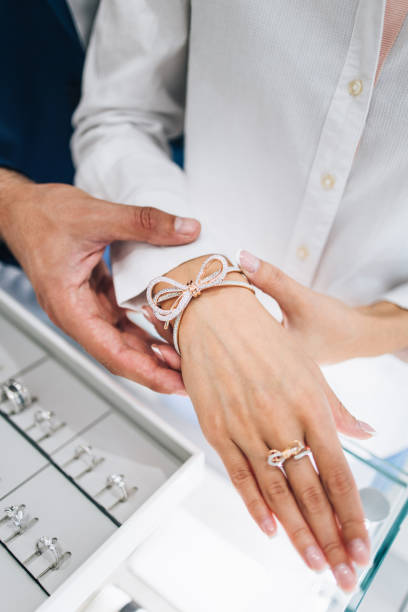 istock Attractive middle age couple at jewelry store 1158207578