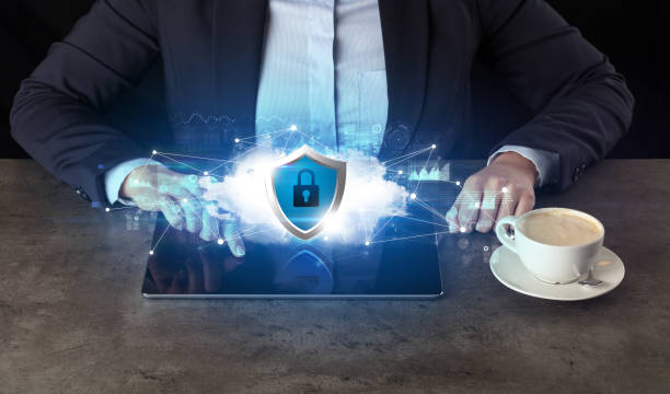 istock Business woman working on tablet with secured  cloud technology concept 1158207809
