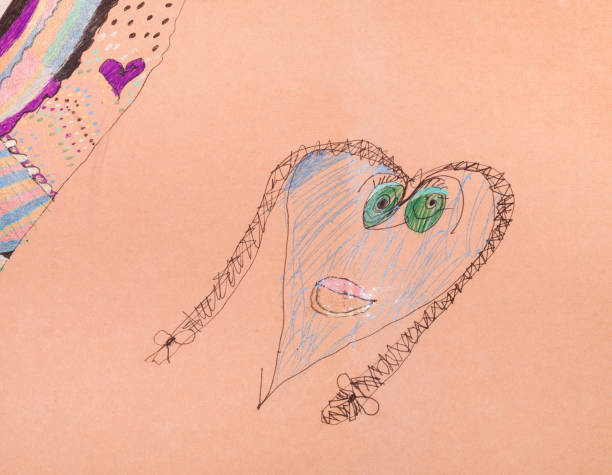istock girl's head with pigtails shaped as heart 1158212422