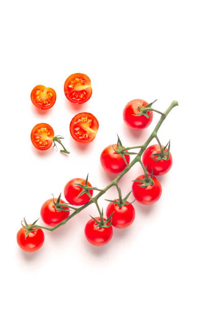 istock Cherry tomatoes with sliced isolated on white background. 1158215198