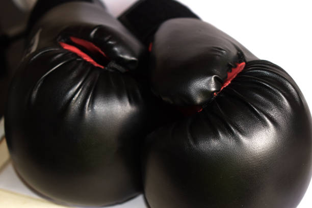 istock black and red boxing gloves on a white background 1158215587