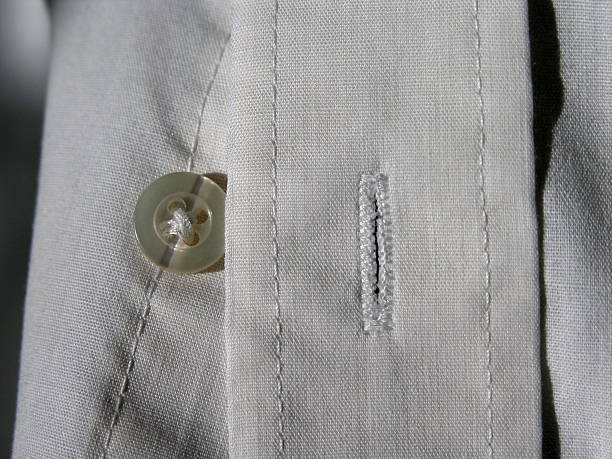 istock Clothing detail, Shirt Button 115821708