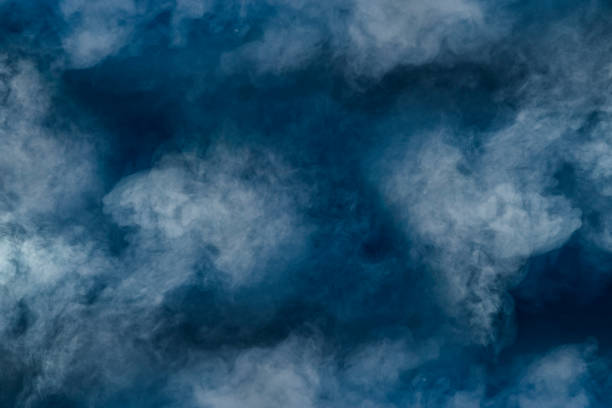 istock spectacular abstract white smoke isolated colorful blue background 1158219314