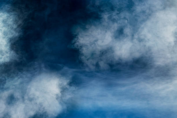 istock spectacular abstract white smoke isolated colorful blue background 1158219315