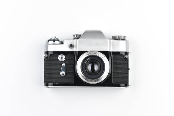 istock Vintage SLR camera isolated on white background 1158220390