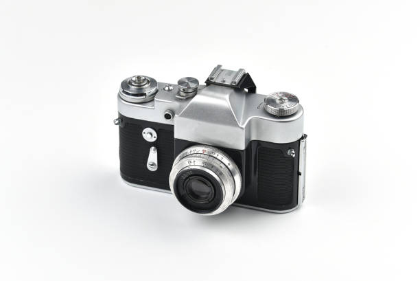 istock Vintage SLR camera isolated on white background 1158220408