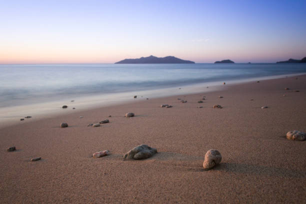 Beautiful white sand beach of Mayotte at sunset