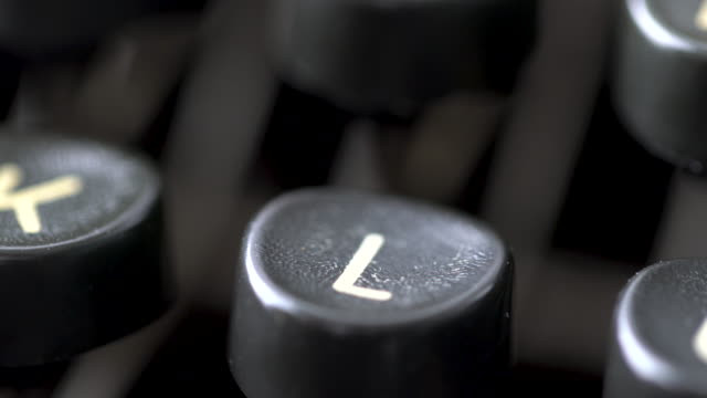 4K Close up of letter in Retro & vintage style typewriter in studio