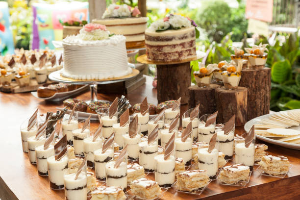 istock Table with sweets, desserts and cakes, decorated table for reception. 1158226626