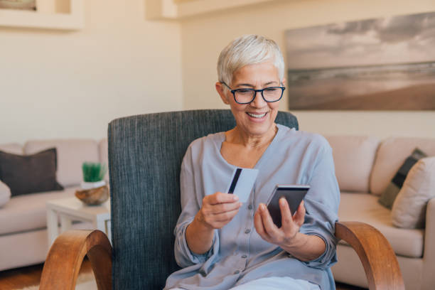 istock Woman shopping online 1158227044