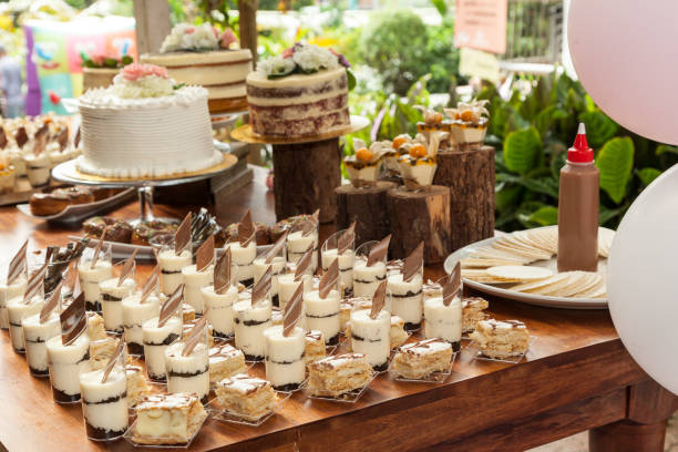 istock Table with sweets, desserts and cakes, decorated table for reception. 1158227050