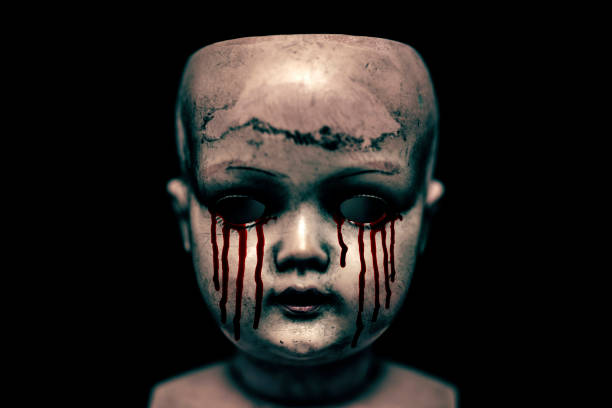 istock Creepy bloody doll in the dark 1158229922