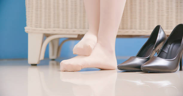 istock woman has athletes foot 1158231752