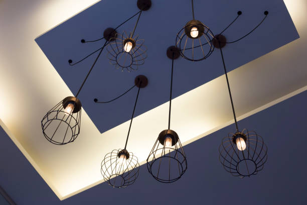 istock Beautiful light Curved lamp from high roof 1158231939