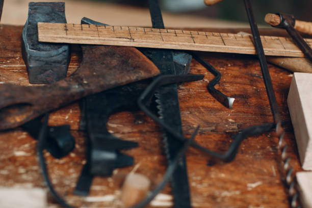 istock Tool carpenter on the table. Planer, ruler, hammer, drill, saw. 1158232672