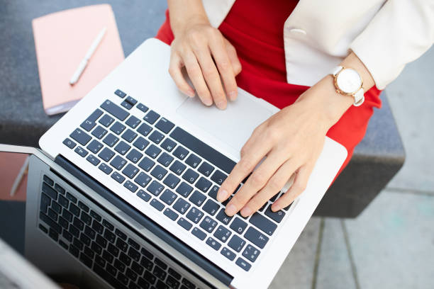 istock Unrecognizable Businesswoman using Laptop 1158236178