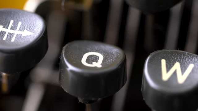 4K Close up of letter in Retro & vintage style typewriter in studio