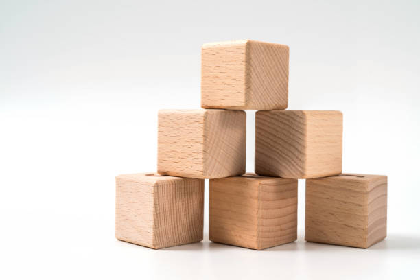 istock wood cube arrange in pyramid shape ,business concept 1158237318