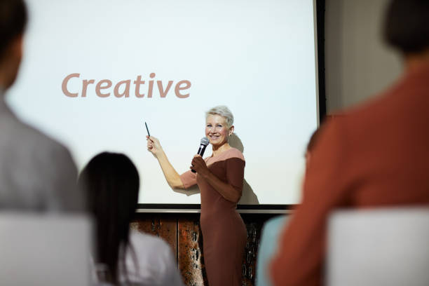 istock Woman Speaking at Business Conference 1158237417