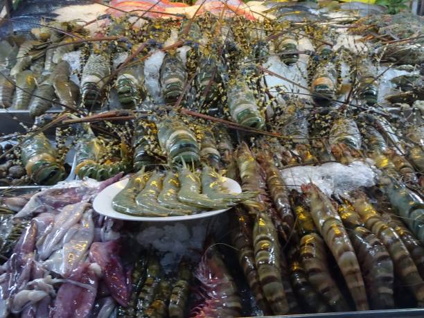 istock Shrimps, lobsters and crabs at a Thai market 1158240436
