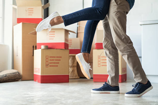 Happy couple moving home