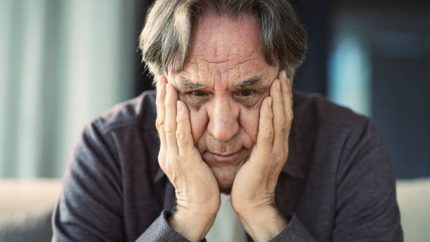 istock Portrait of thoughtful senior man 1158244642