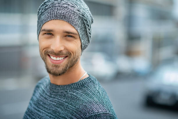 istock Smiling handsome man in winter clothes 1158245282