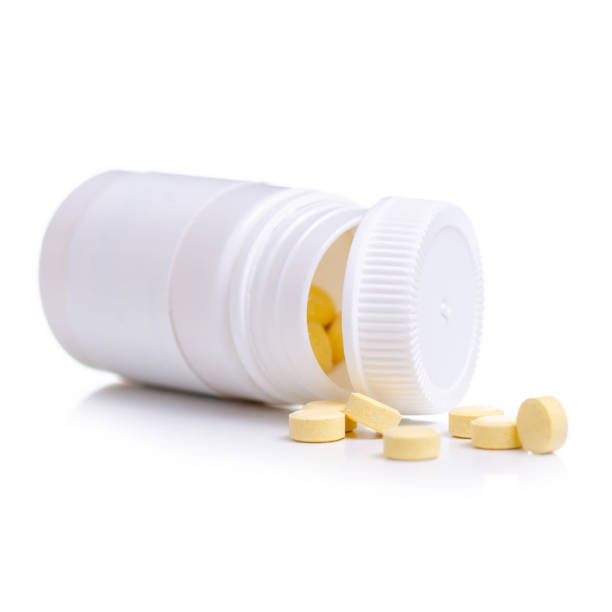 istock White jar with pills medicine pharmasy 1158245453