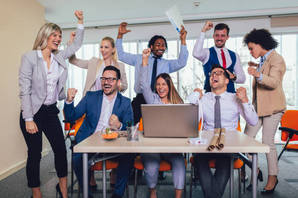 istock Group of young business people working together in creative office. 1158247177