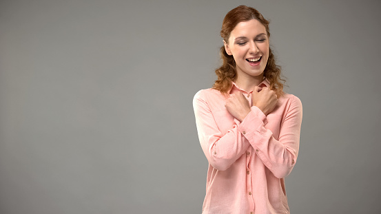 Woman saying love you in sign language, teacher showing words in asl, lesson