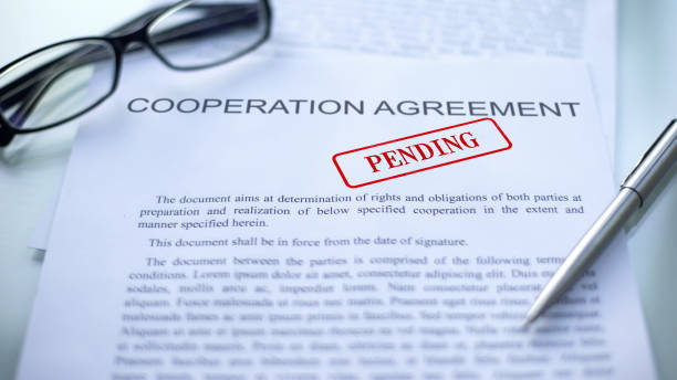 istock Cooperation agreement pending, seal stamped on official document, business 1158250232