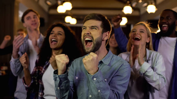 istock Cheerful young people rejoicing team victory, professional team achievement 1158250795