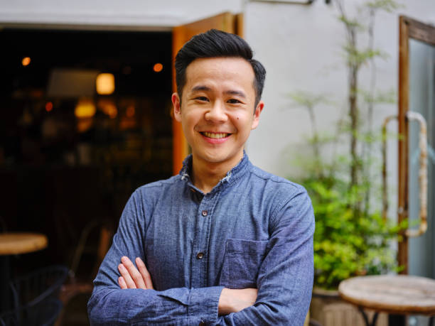 istock Young Professional Man Working in a Small Coffee Shop 1158252449