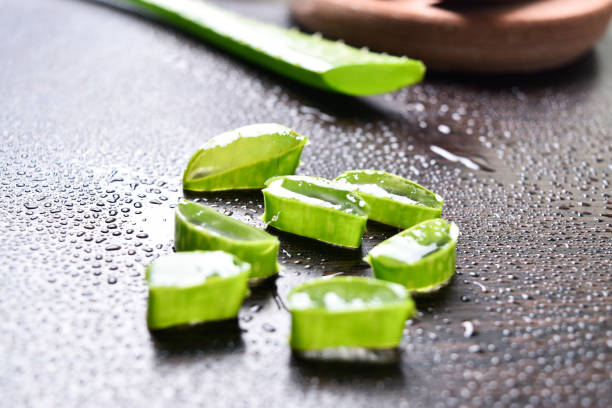 istock aloe vera slices with water drops on table 1158256464