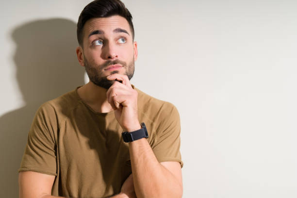 istock Young handsome man over isolated background serious face thinking about question, very confused idea 1158256685