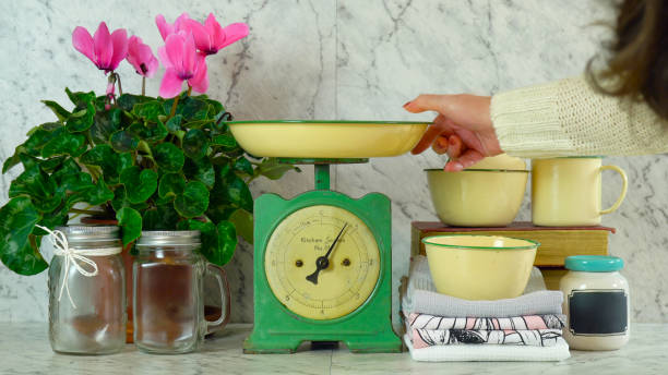 Vintage kitchen scale decor with farmhouse style kitchenware.