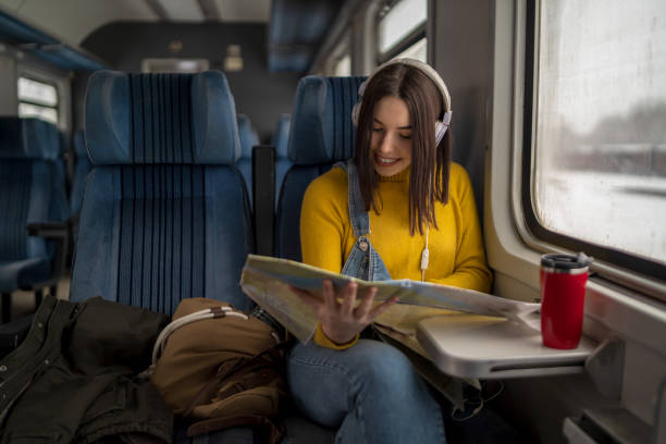istock Young woman traveling by train 1158262327