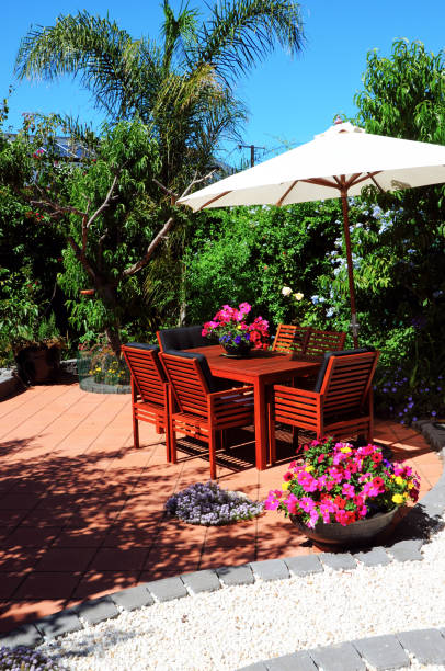 istock Beautiful summertime Mediterranean style courtyard garden setting. 1158262371