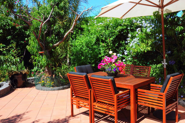 istock Beautiful summertime Mediterranean style courtyard garden setting. 1158262732