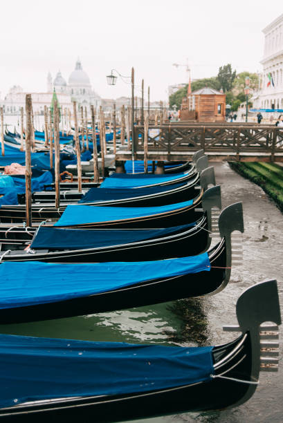 Beautiful view on a grand canal of Venice, gondolas, transportation, travel summer vacation concept stock photo