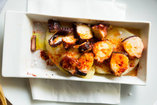 istock Boiled octopus with baked potato 1158262777