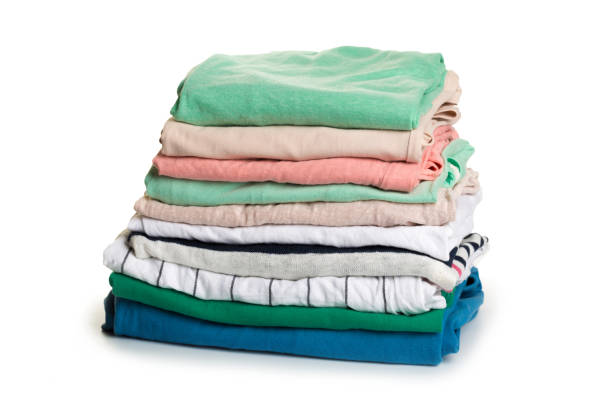 istock stack of clothing isolated on white background 1158268265