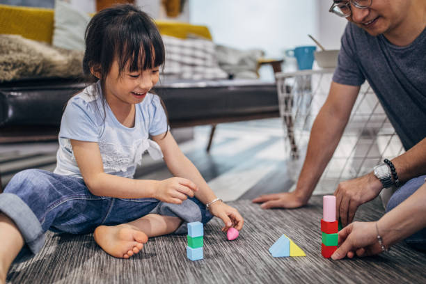 istock Family playing with toys 1158270552