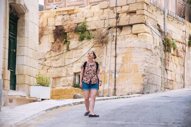 istock Traveler exploring her destination on foot 1158271923