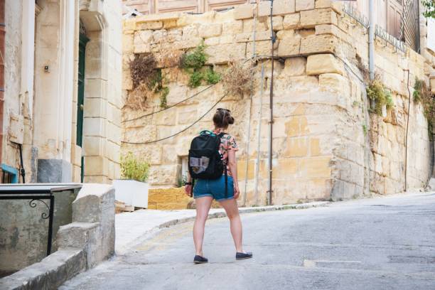 istock Traveler exploring her destination on foot 1158272045