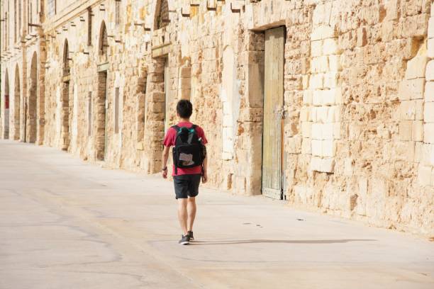 istock Traveler exploring his destination on foot 1158272068